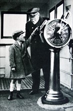 Child visiting the Bridge of an ocean liner with the captain 1936