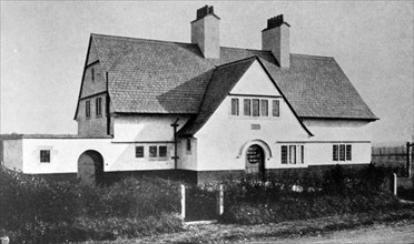 Photograph of the exterior of a Voysey House in Beaconsfield