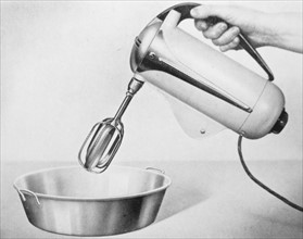 Advert for a hand held food mixer
