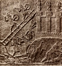 Relief of a siege depicts Assyrians attacking a fort. 1365–609 BC