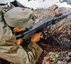 German soldier aiming a gun