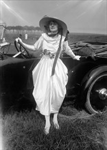 American silent film star Gertrude McCoy in her Oldsmobile 1917