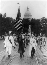 Group parading in front of the dome of the U.S. Capitol.