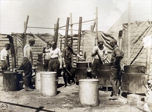 The open air kitchen used by German prisoners while a new mess hall and kitchen is being erected at Camp Miramas