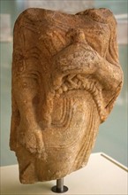 Marble statue of Kore holding a bird as an offering