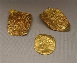 Embossed decorative gold fragments