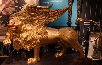 Gilded statue of a winged lion