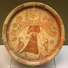 Plate depicting a winged goddess with a Gorgon's head