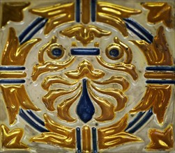 Gold lustre tile with two lions