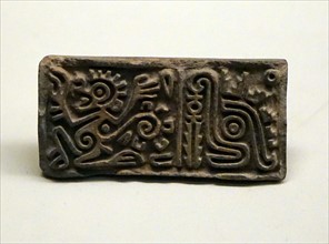 Fragment of Aztec stone box bearing the image of a water opossum