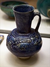 12th Century jug with foliate and zoomorphic decoration