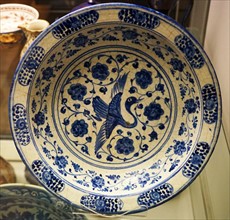Dish with flying crane and arabesque design