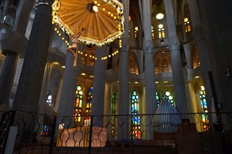 Suspended crucifix and glass altar in La Sagrada Família