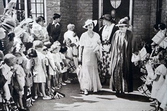 Lady Elizabeth meeting children outside a children's home