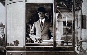 Prince Albert driving a tram