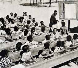 South African black children in an open-air school classroom. 1936