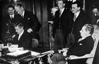 Russian Ambassador Potemkin signs treaty with French Prime Minister Pierre Laval