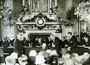 Frank B. Kellogg signing the KelloggñBriand Pact