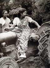 Ceylon Farmerettes leering to drive tractors in England