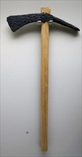 Dolabra with a reconstructed wooden handle