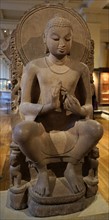 Stone carving of a seated Buddha from Sarnath