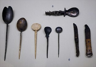 Collection of spoons and knives from 1st Century AD