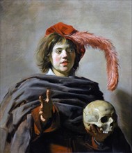 Young Man holding a Skull