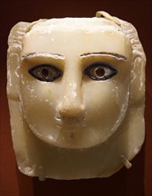Carved stone head with coloured glass inlay from Ma'rib