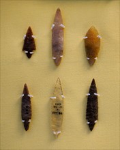 Collection of flint and rock crystal arrowheads and a flint knife