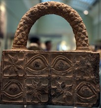 Carved stone with integral handle from the ancient city of Ur