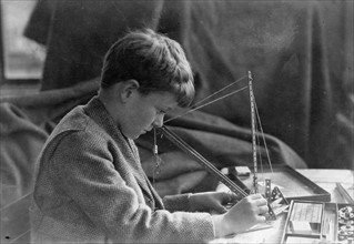 Boy with mechanical toy by Lewis Wickes Hine