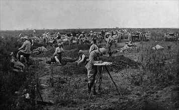 French soldiers rest during an advance towards German positions.