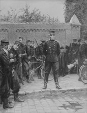 King Albert I of Belgium observes wounded Belgian soldiers.