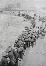Australian soldiers receive a briefing.
