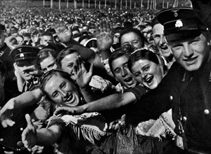 Adolf Hitler receiving the adulation of a crowd in Buckeberg 1935