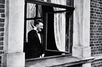 Adolf Hitler at a window receiving the adulation of a crowd in Bayreuth