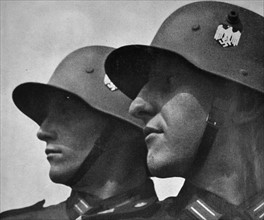 German army soldiers with Swastika on their helmets