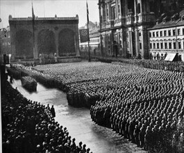 German army recruits pass out at graduation from training with a parade through Munich 1935