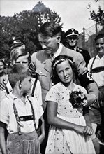 Adolf Hitler, greeted by Hitler Youth