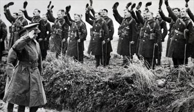 King George VI of Britain greeted by British soldiers in France