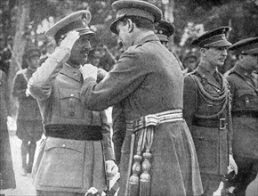 The King Alphonso XIII gives a Military Medal to General Franco