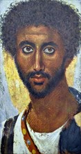Encaustic portrait from a coffin at Fayum, Egypt 100 A.D.