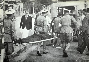 casualty from street fighting arrives at a Barcelona hospital during the Spanish civil war 1938