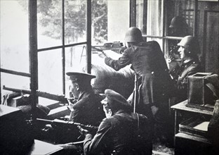 republican soldiers fire from a building during the Spanish civil war, Barcelona 1937