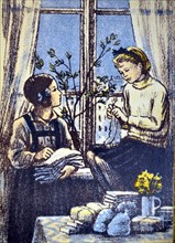 Soviet Russian WWII postcard showing two Russian girls at home