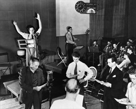 Orson Welles rehearsing a radio broadcast of H.G. Wells' classic