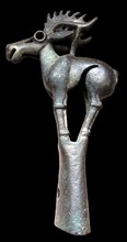 Bronze pole-top in the form of an elk. Ordos type, 6th-5th century BC.