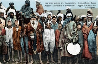 Trans Caspian men and boy street actors in Samarkand