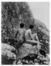 Two male nudes on a rock by Wilhelm von Gloeden