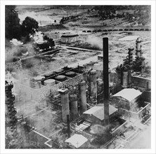 Oil storage tanks at the Columbia Aquila Refinery after Air Raid